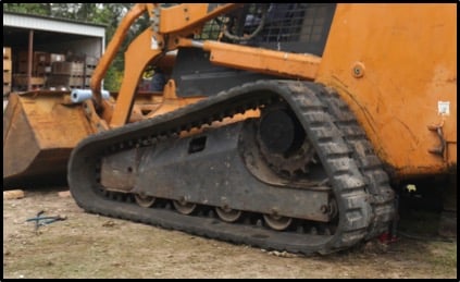 undercarriage of a Case 450 track loader